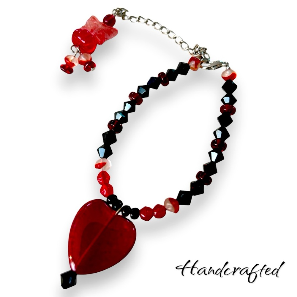 Handcrafted bracelet - 7in with extender and charm. Glass heart and butterfly.